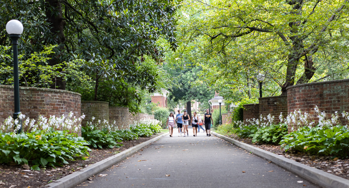 Students near serpentine gardens