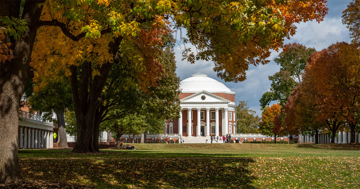 UVA's Rotunda surrounded by fall trees.