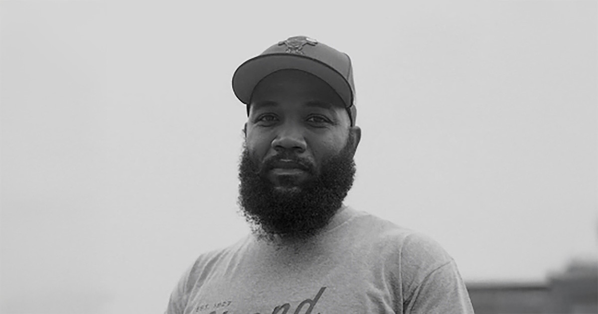 Black and white headshot of A.D. Carson