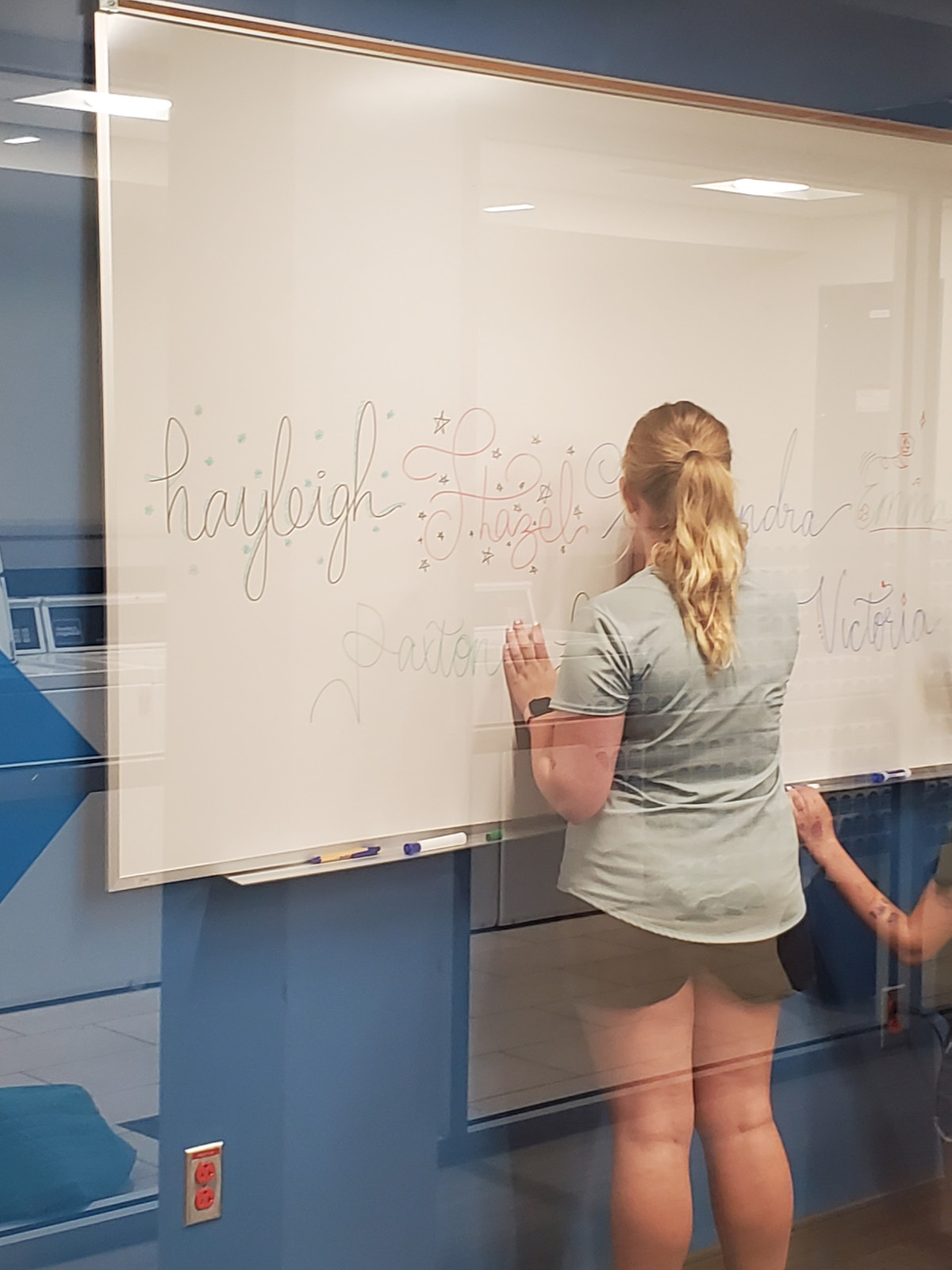 student at whiteboard