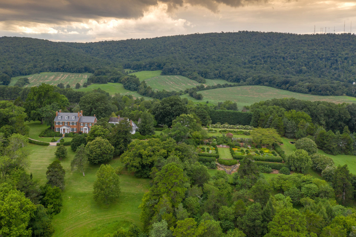 Aerial view of Morven farms showing numerous acres of green grass and trees.